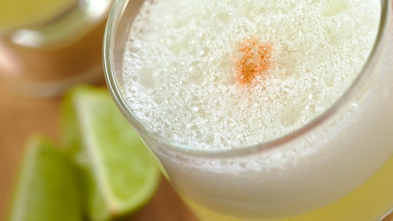 Chilean Pisco Sour, Chilean cocktail with pisco, egg white and lime juice
