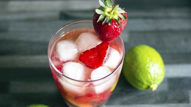 Strawberry caipirinha cocktail, the original recipe from Brazil. Cocktail recipe