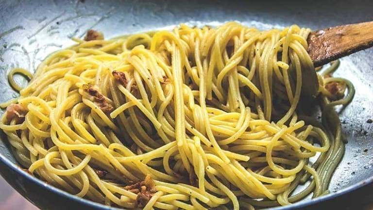Italian food, Spaghetti carbonara made with guanciale eggs, pecorino cheese