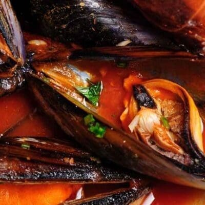 Cozze alla tarantina recipe, mussel soup with spicy tomato sauce, Italian recipe