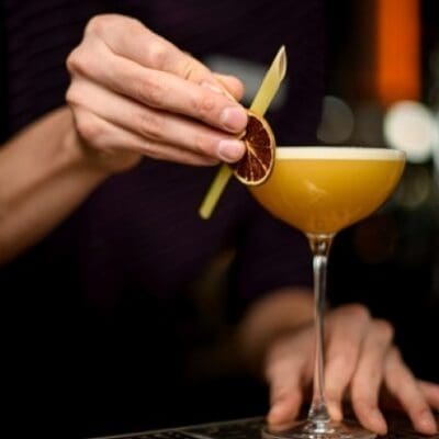 Mexican Fever drink recipe, cocktail with mezcal, elderberry syrup, mango juice