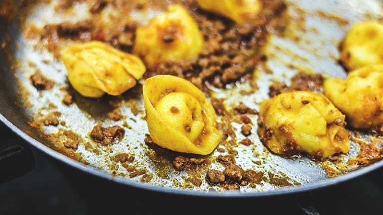 Cappelletti romagnoli with cheese with meat sauce, the original recipe